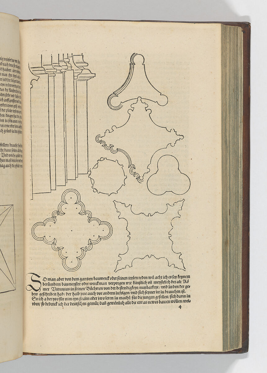 An open printed book shows geometric construction diagrams beside letterpress text.