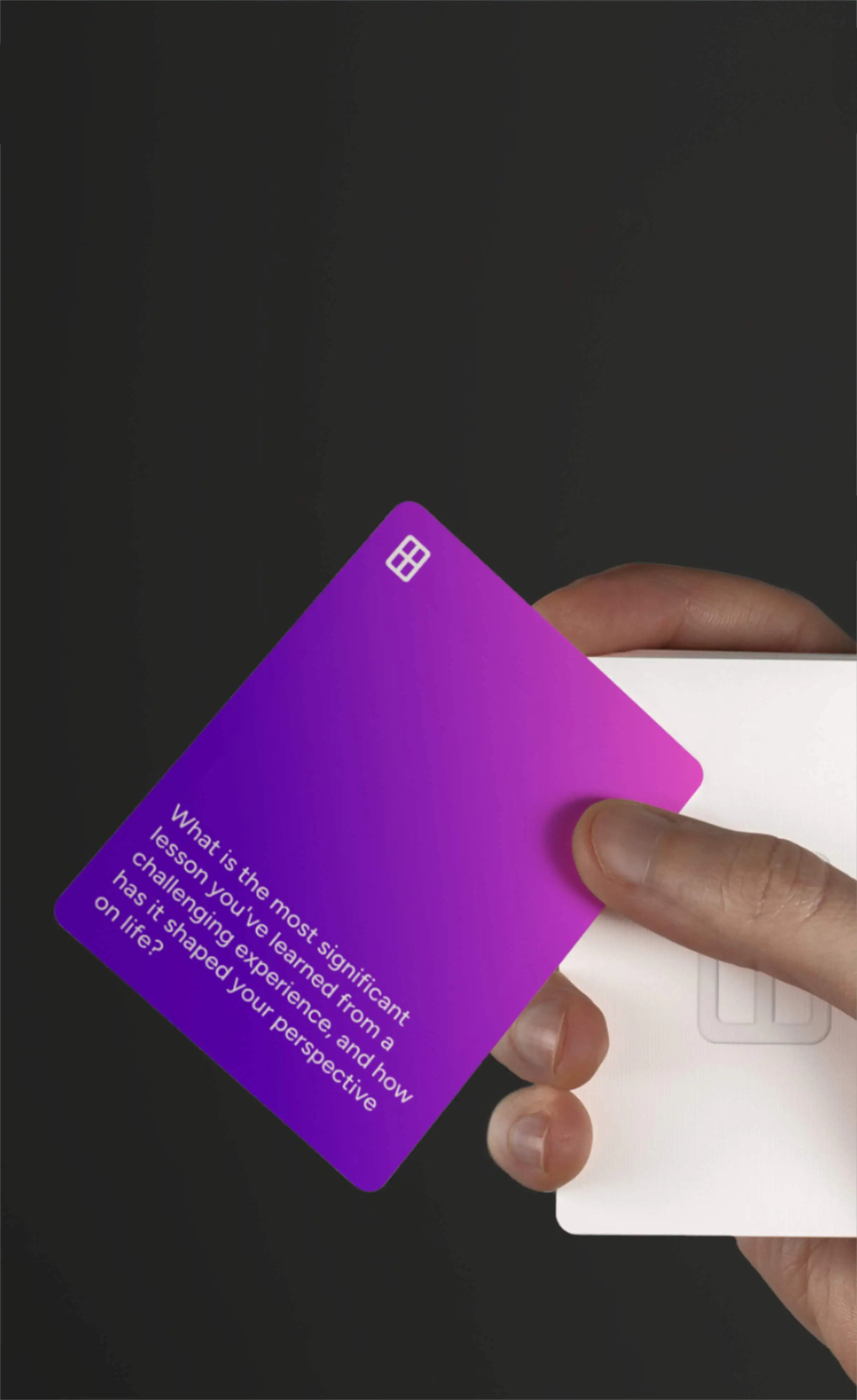 Candid conversation cards shown with an iPhone and a hand.