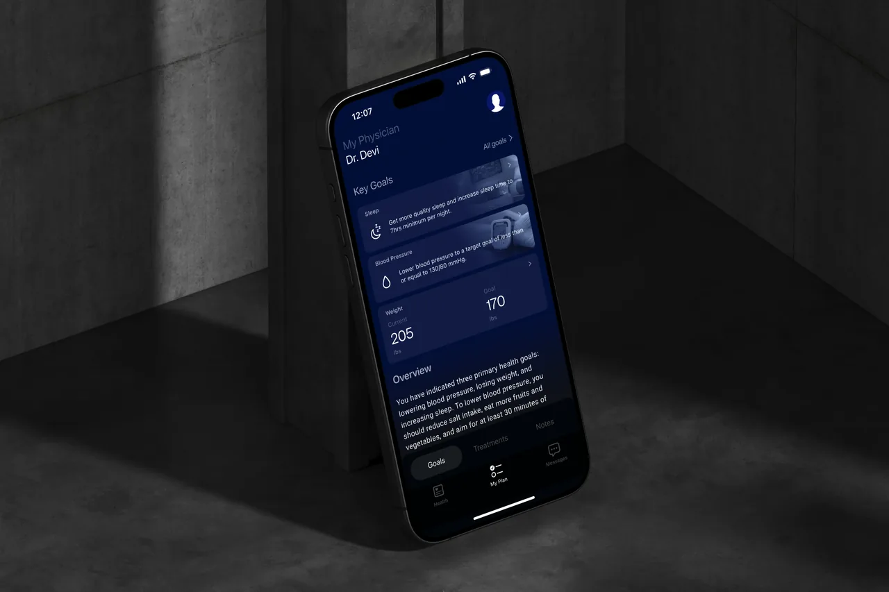 iPhone 16 displaying Opt Health app with personalized health goals for sleep, blood pressure, and weight.