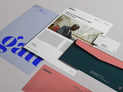 Branded stationery set for Gander, including letterhead, envelope, business card, and folder.